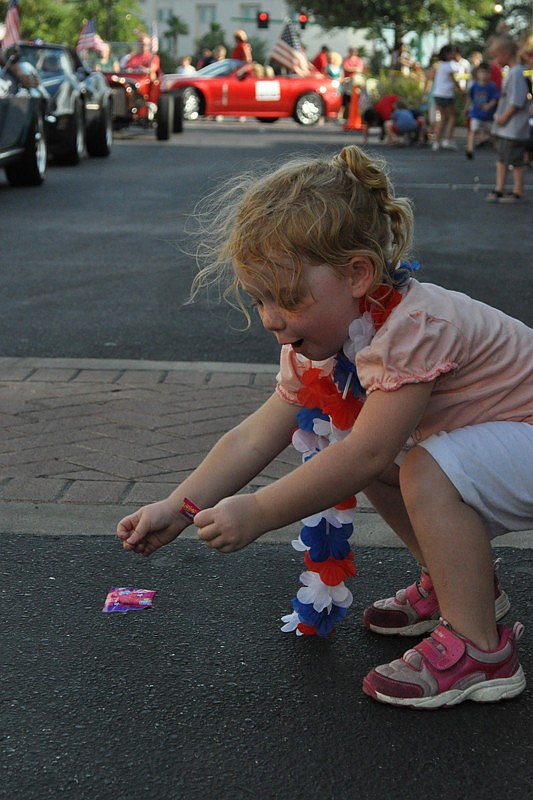 Olivia Michaels, 3, grabbed as much candy as she could.