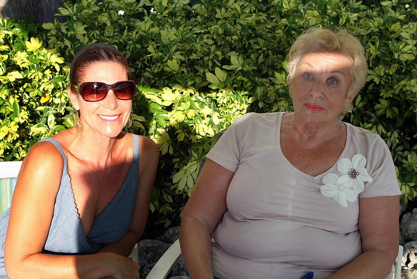 Marissa Barker and Leah Barker enjoy some quality mother-daughter time at the Longboat Key Club's BBQ and Movie night Saturday, May 28 at the Longboat Key Club hotel poolside.