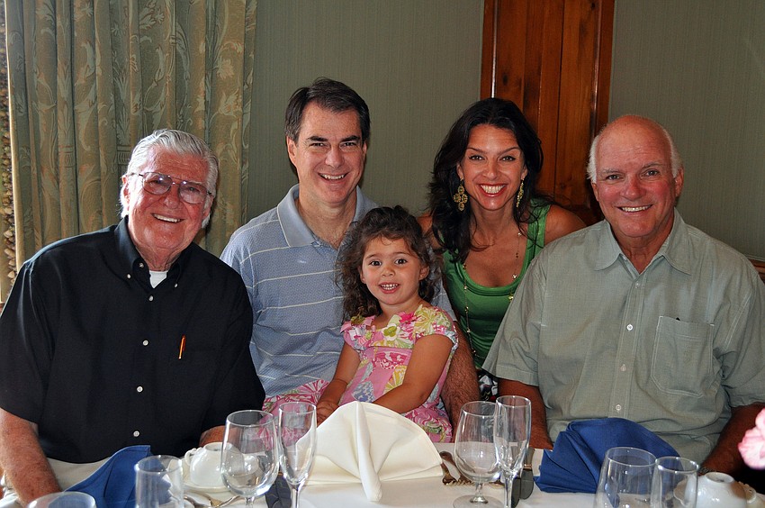 Carroll Cogan sits next to his son, Chris, and grand-daughter, Bella, 3 while Aimee Demariano-Cogan poses next to her father and Bella's other grandfather, Paul DeMariano at the Father's Day Brunch Sunday, June 19 at the Oaks Club.