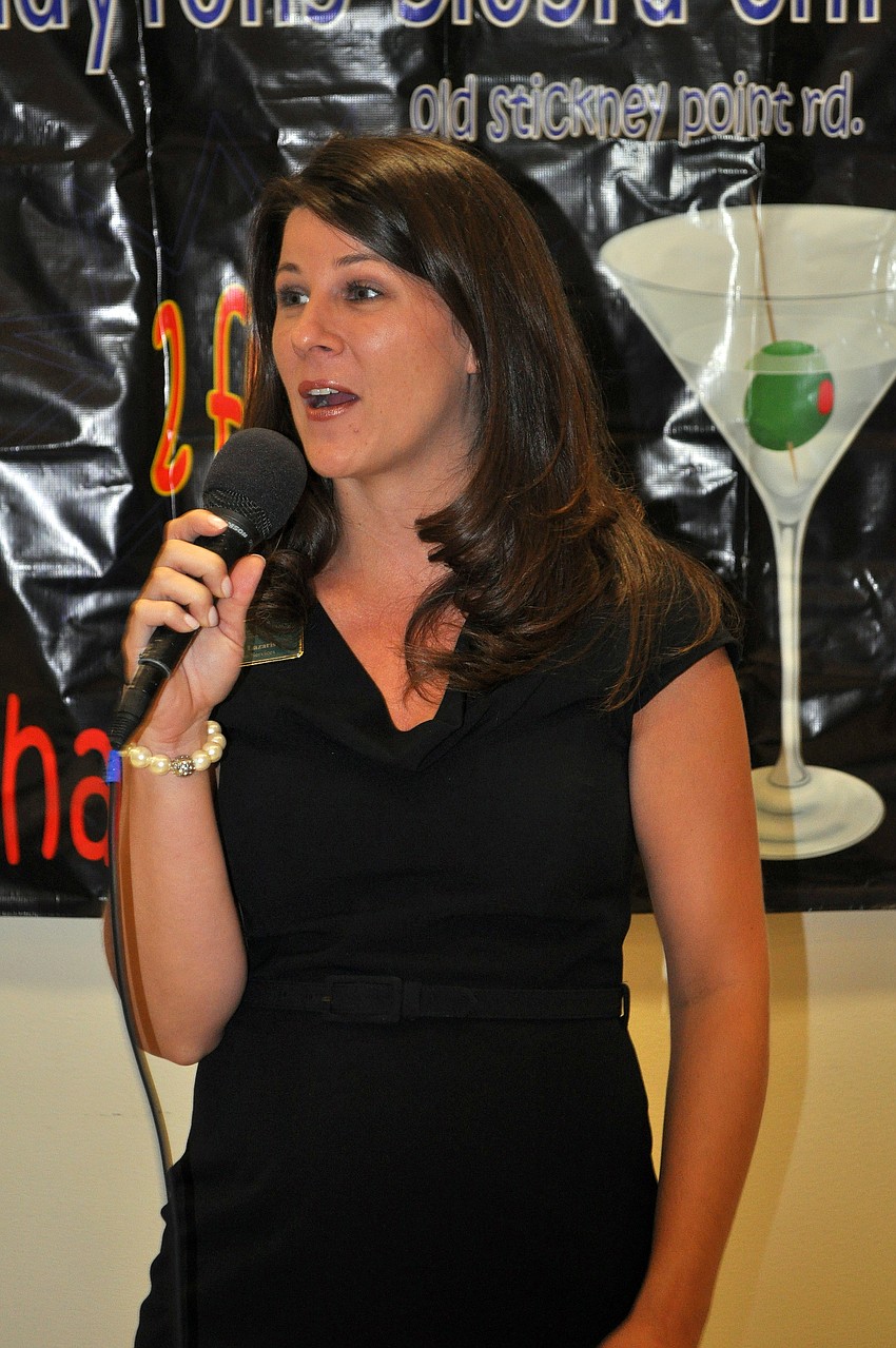 Julie Lazaris, representing The University of South Florida â€“ Sarasota Manatee, speaks to the crowd Wednesday, July 13 at Sarasota Prime Time.