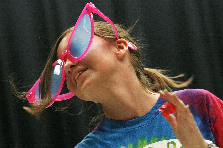 Liana Price earned quite the applause with her huge sunglasses.