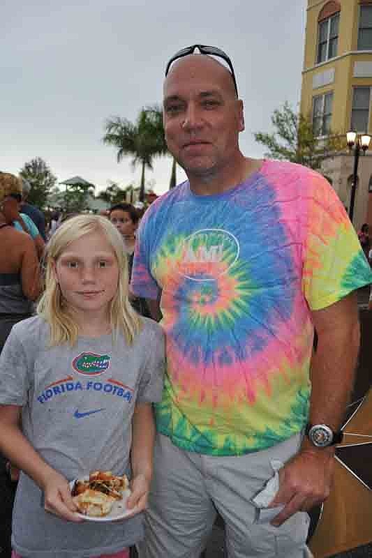 Loren McGrede and her dad, John, waited to taste all the barbecue samples before admitting a favorite.