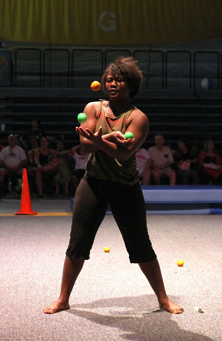 Edith Keme, a member of Circesteem and the Chicago Youth Circus of Chicago, IL, shows off her juggling skills.