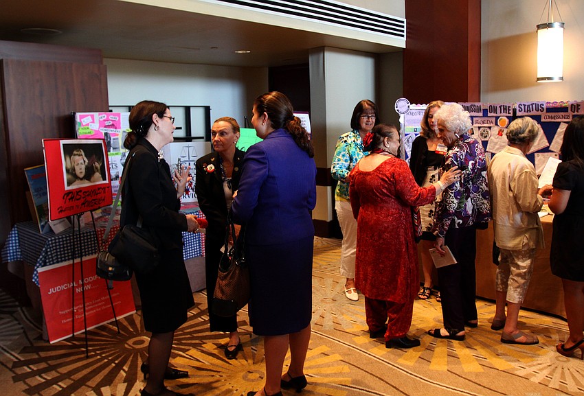 Those in attendance chatted with one another and checked out the various exhibits in the lobby before heading in for lunch.