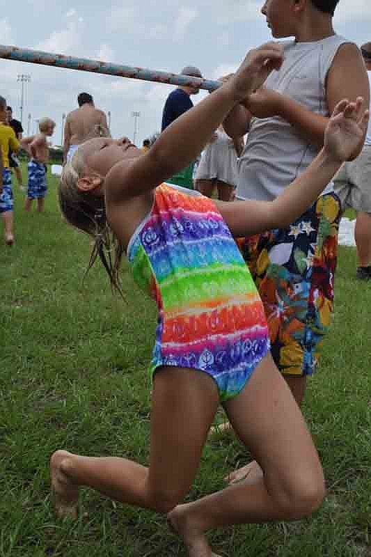 Children did the Limbo as part of the festivities.