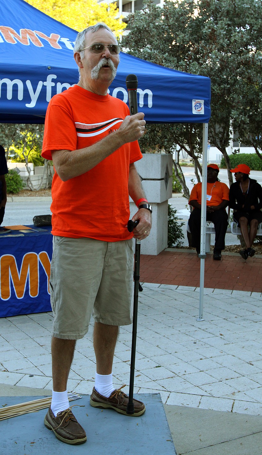 Walk Ambassador William Thompson talks to the crowd before Walk MS Sarasota on Saturday, March 19, at J.D. Hamel Park.