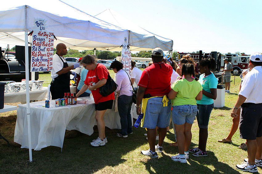 People line up for food on Saturday, March 19 during the Sarasota Springfest out at Palmer Ranch.
