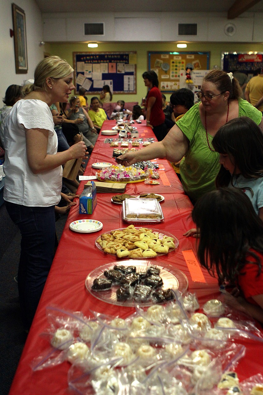 People bought some goodies on Sunday, March 20 at Temple Emanu-El's Purim Carnival.