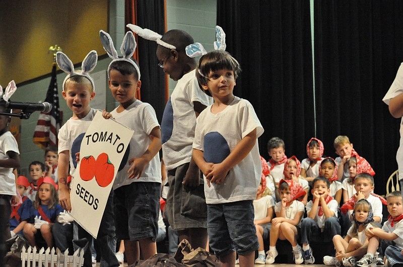 Pre-kindergarten students Nolan Mirikitani, John Moschella, Xander Garnes and Jake Thompson introduced the play with a short performance.