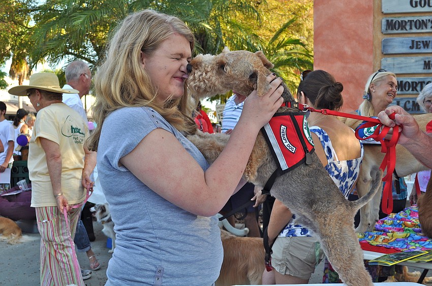 Taylor Teague gives Cooper a kiss.