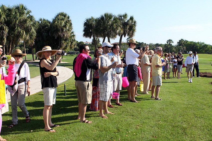 Parents stand ready to capture their children participating in the Easter egg hunt Sunday, April 24 at Longboat Key Club.