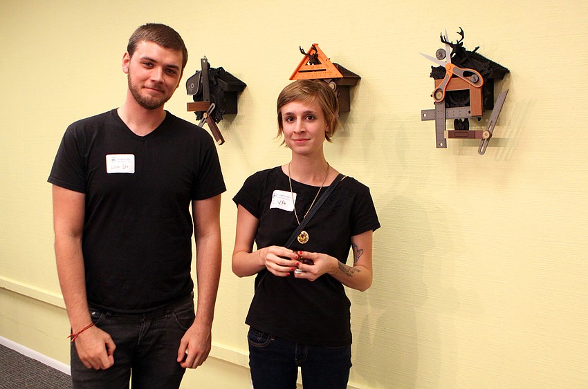 Justin Volz and Eva Langsdon, Ringling alumni, attended the opening of the RCAD Creatives Exhibition Thursday, May 19 at Longboat Key Center for the Arts.