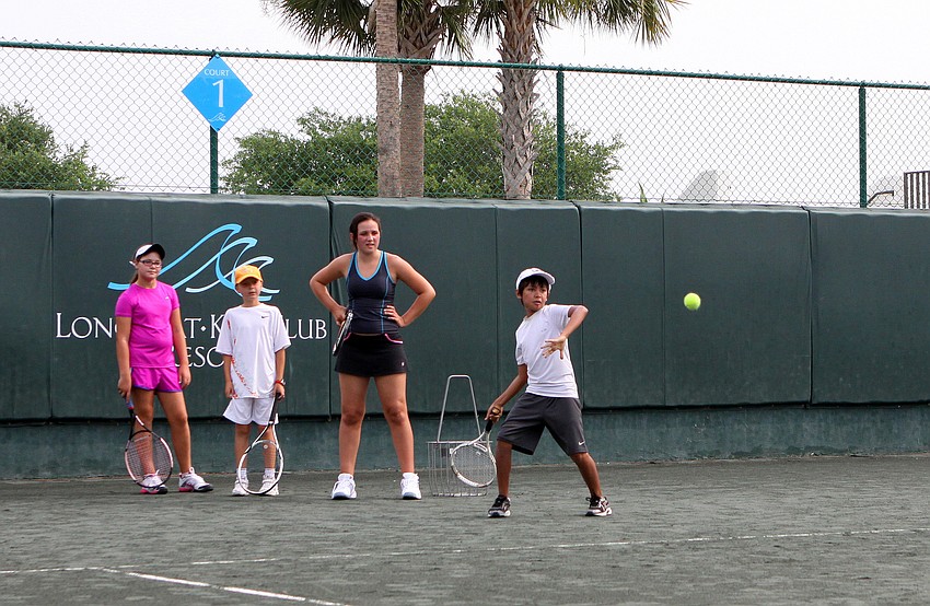 Jack Lum, 10, prepares to hit the ball during a round of King of the Court during Longboat Key Club's Tennis Camp Monday, June 6 at Longboat Key Club's Tennis Gardens.