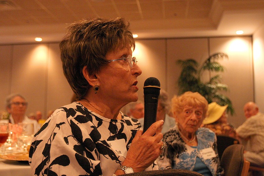 Sue Bralow asks a question during the Q&A portion of AJC's Lunch and Lecture Wednesday, June 15 at Michael's on East.