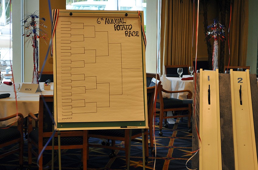 The 6th Annual Potato Race was set up in the dining room as an activity for people to get involved in during dinner Monday, July 4 at Bird Key Yacht Club.