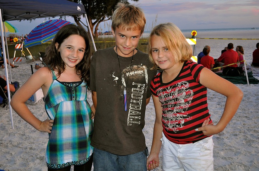 Camryn Fryer with Nicholas and Hailey Moure