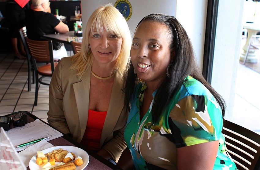 Dawn Mims and Shantell Mankwoski worked the check-in table for the Longboat Key Chamber event Thursday, July 21 at the Sports Page.
