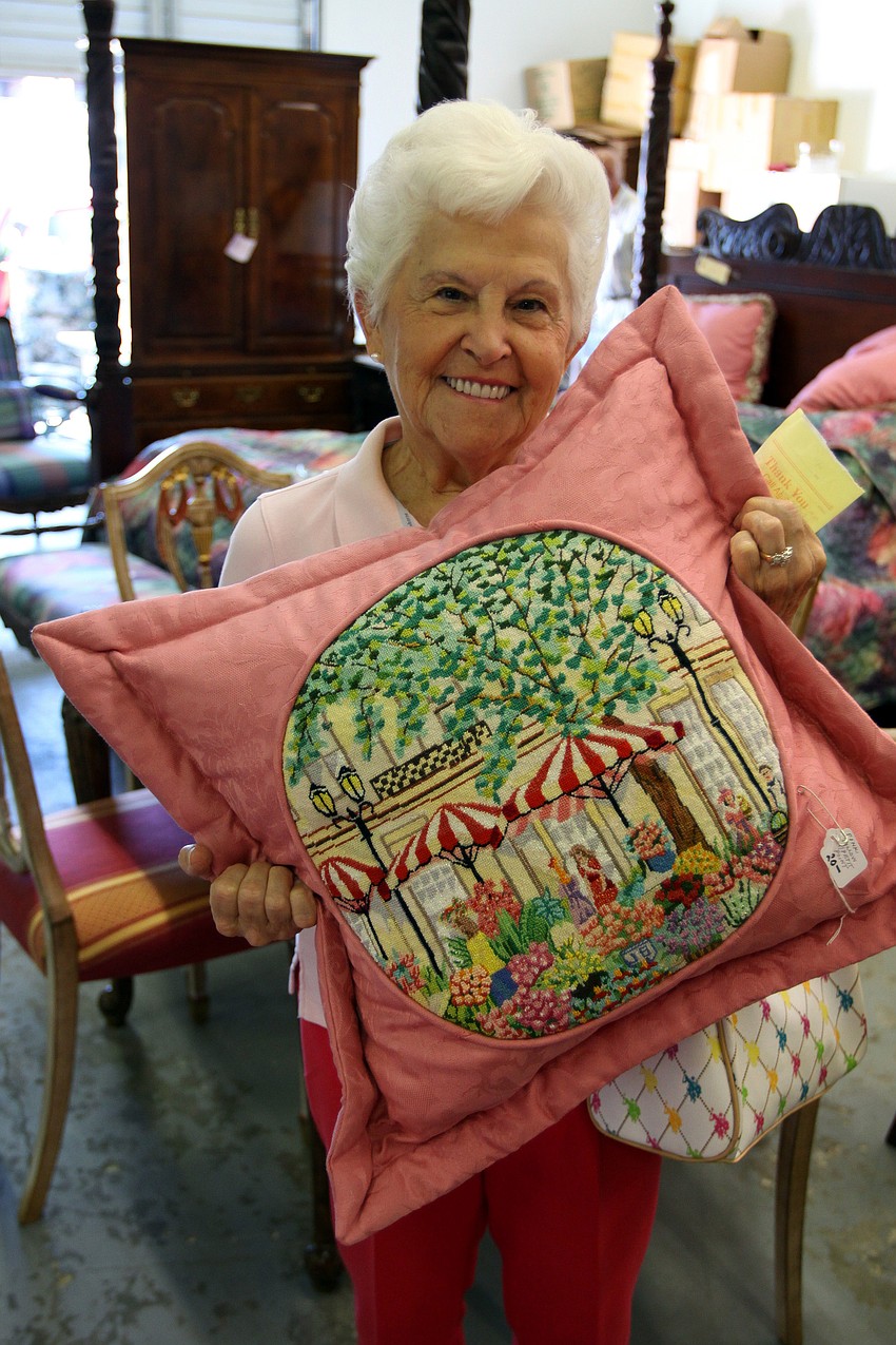 Pat Jones bought a pillow Friday, July 22 at the estate sale. â€œI will probably give it to one of my childrenâ€¦ I always support the Y,â€ said Jones of why she was purchasing the pillow.