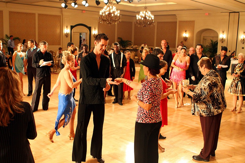 Participants wait to find out how they placed Wednesday, August 3 during the Florida State DanceSport Championships at the Ritz Carlton Sarasota.