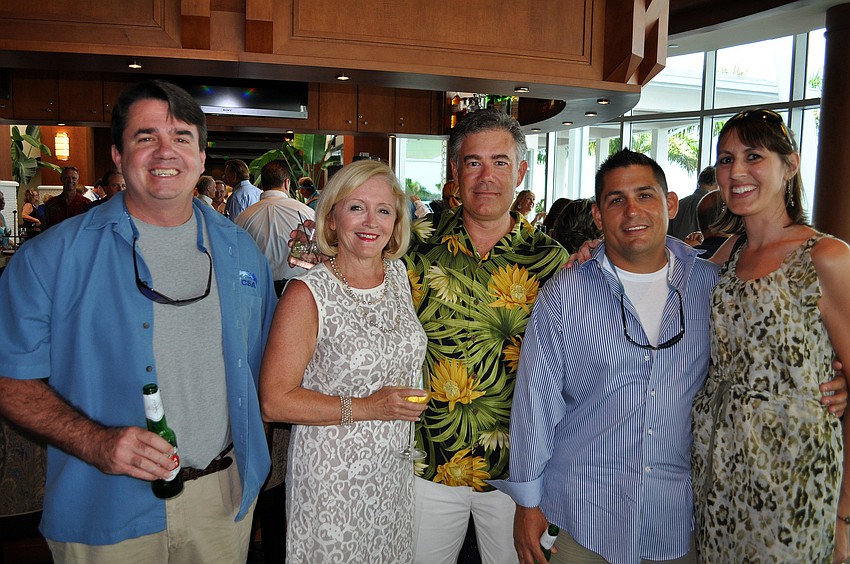 Eddie Hughes, Susan Cameron, David Kane and Ray and Sarah Dennis pose together Saturday, August 6 during Scallopalooza at the Sarasota Yacht Club.