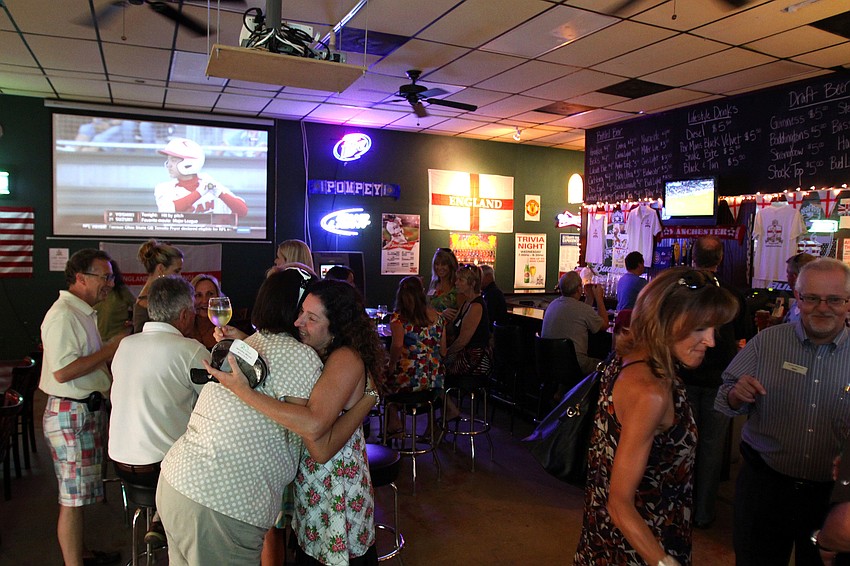 Members of the Siesta Key Chamber of Commerce got together for a business card exchange Thursday, Aug. 18 at King George Pub.