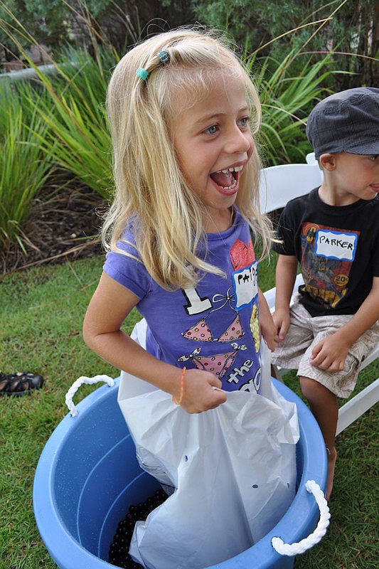 Paige McElyea had a blast smashing grapes with her feet.