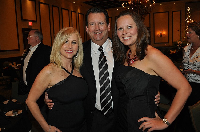 Anita and Mike Rahn and Melissa Joiner