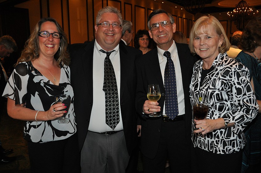 Cheryl and Neil Unruh with Tom and Terry Salsbury