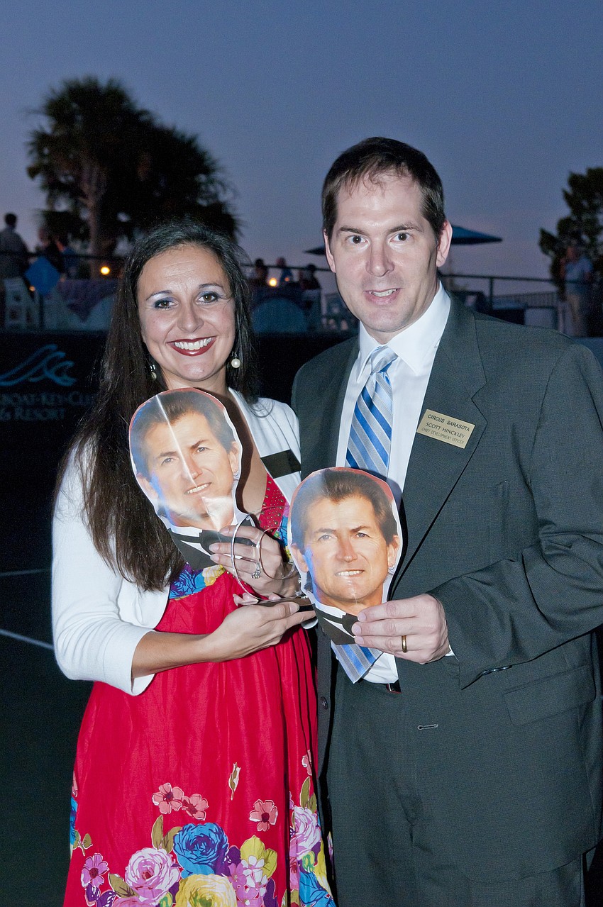 Jennifer Mitchell and Scott Hinckley accept standout man award for Pedro Reis