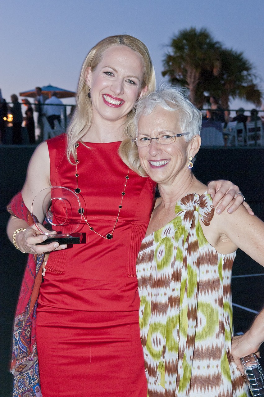 Ariane Dart and Betsy Kane Hartnett with standout event award for Forty Carrots Firefly Gala