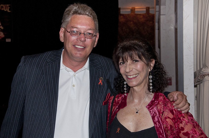 Community AIDS Network CEO Michael Cuffage and Carolyn Michel