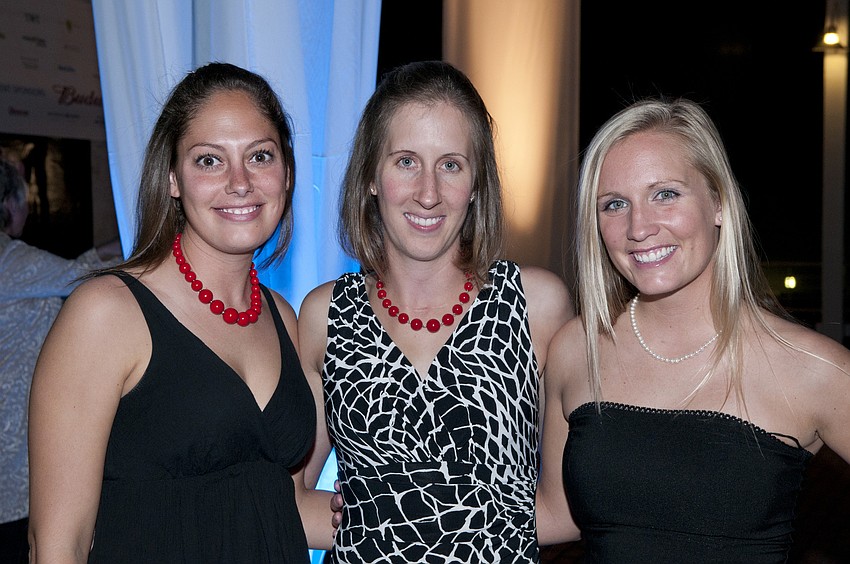 Penguin handlers Laura Denum, Erin Hennessy and Kat Nicolaisen