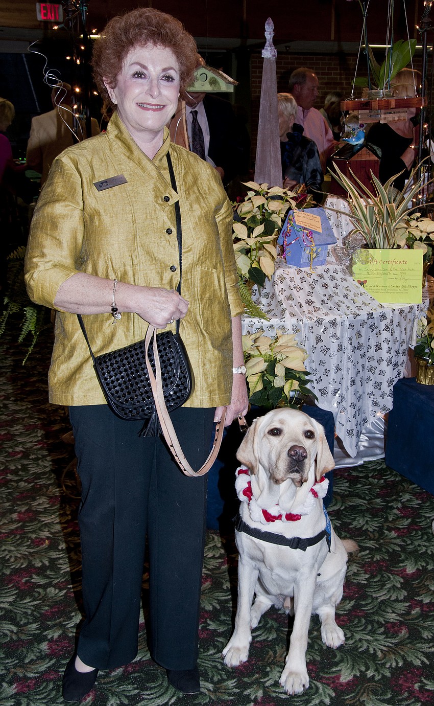 Discovery Center Outreach Coordinator Marjorie Singer  and Millard, Ambassador of Southeastern Guide Dogs