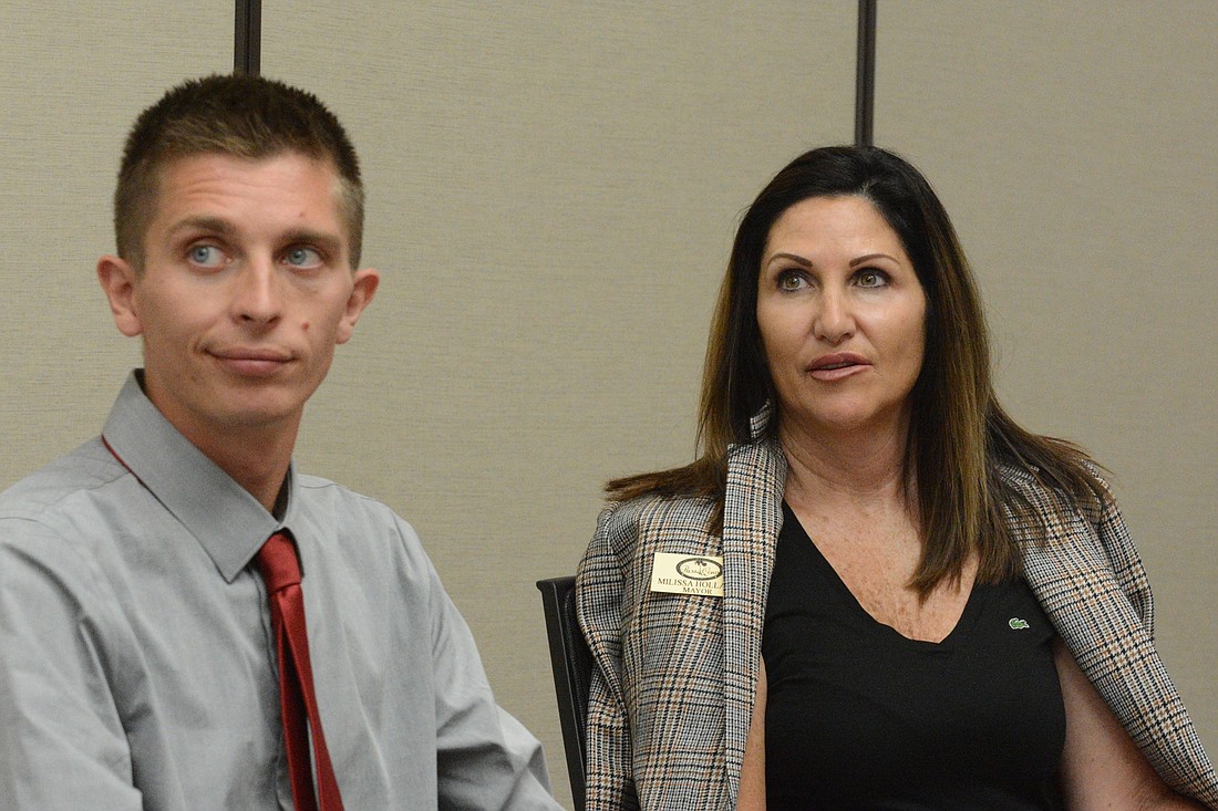 Palm Coast Mayor Milissa Holland, at right, thinks the city might need to regulate ride-sharing services for safety reasons. Councilman Nick Klufas is at left. (Photo by Jonathan Simmons)