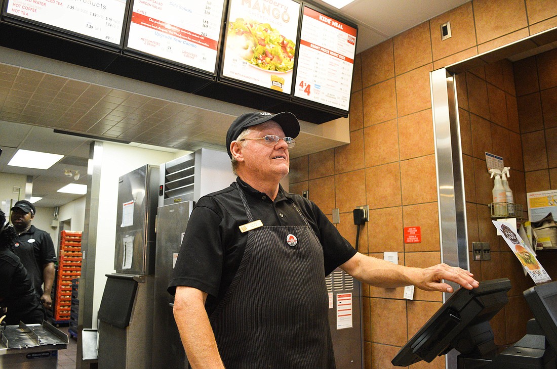 Jerry Sult, 64, takes a customer's order. Photo by Paige Wilson