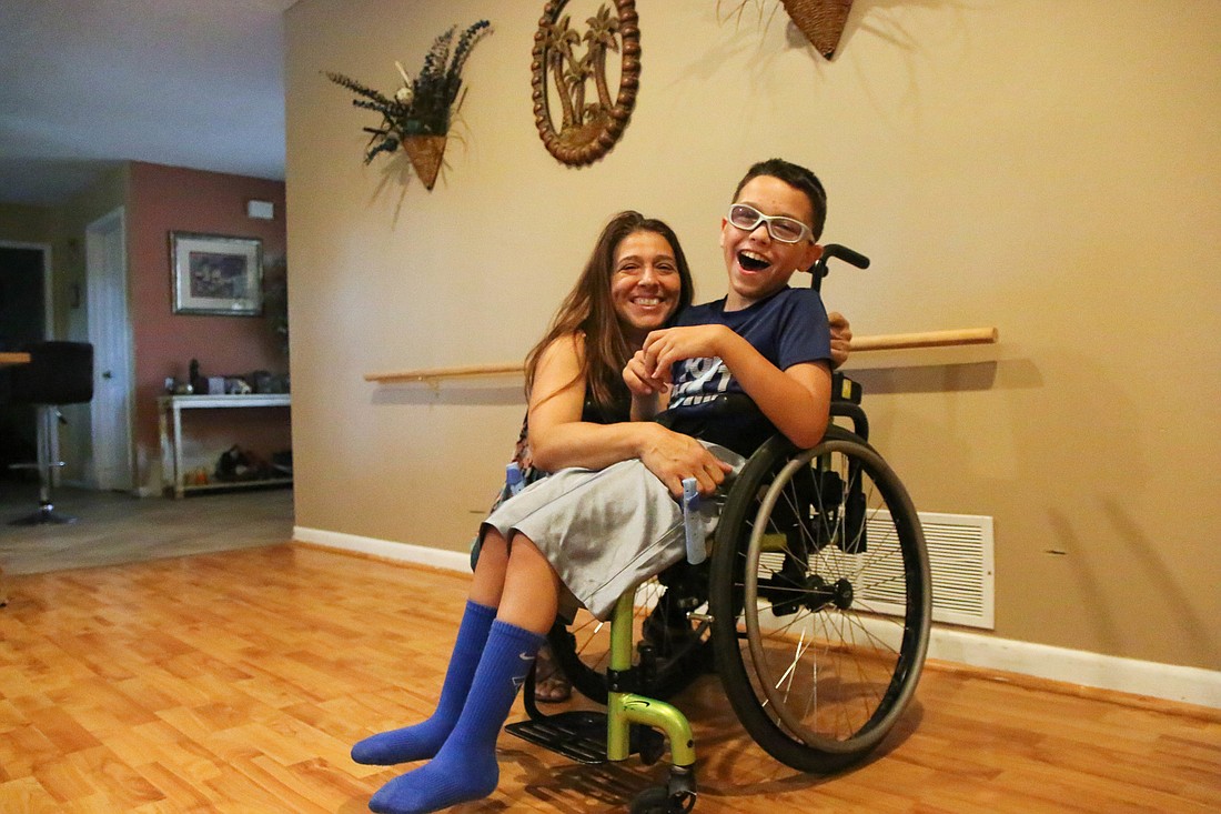Brian Castillo, 10, and his mother Dawn Martinez. Photo by Paige Wilson