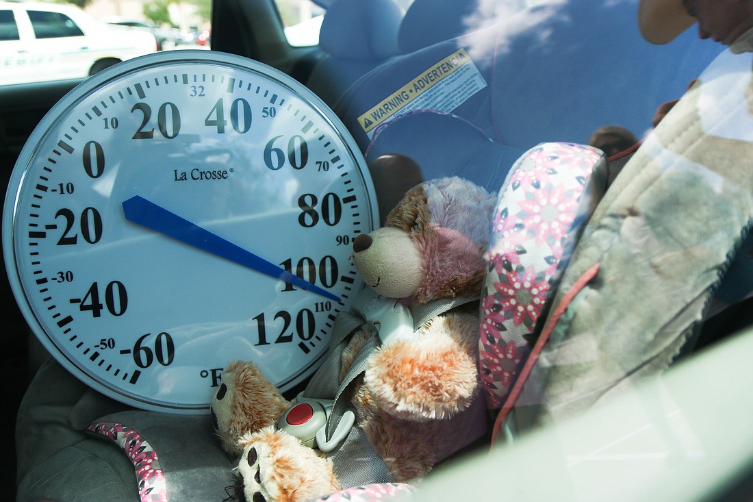 After about nine minutes in 91-degree weather, the car's internal temperature had gone up about 16 degrees. Photo by Paige Wilson