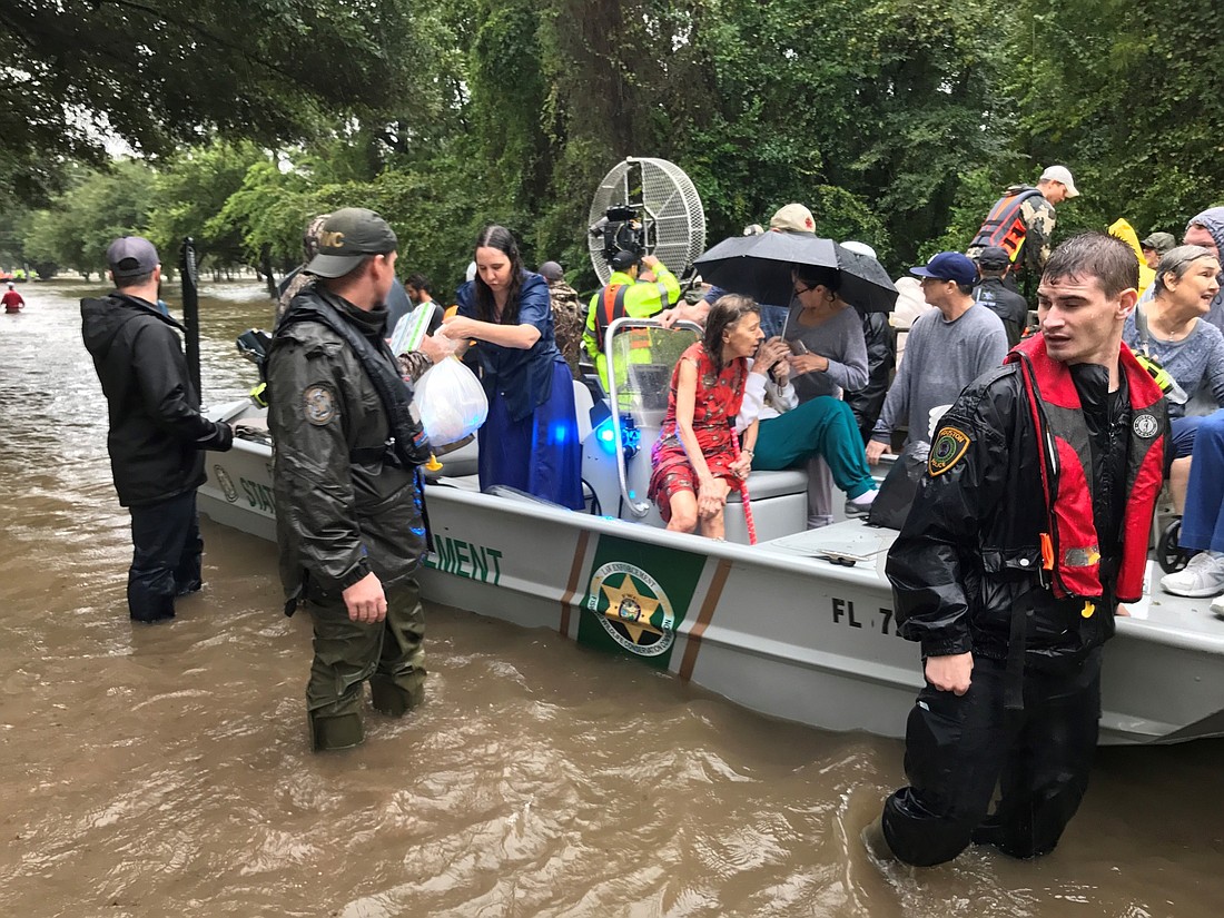 Florida Fish and Wildlife officers use an aluminum boat to rescue Texas residents after Hurricane Harvey. Photo courtesy of the Office of Gov. Rick Scott