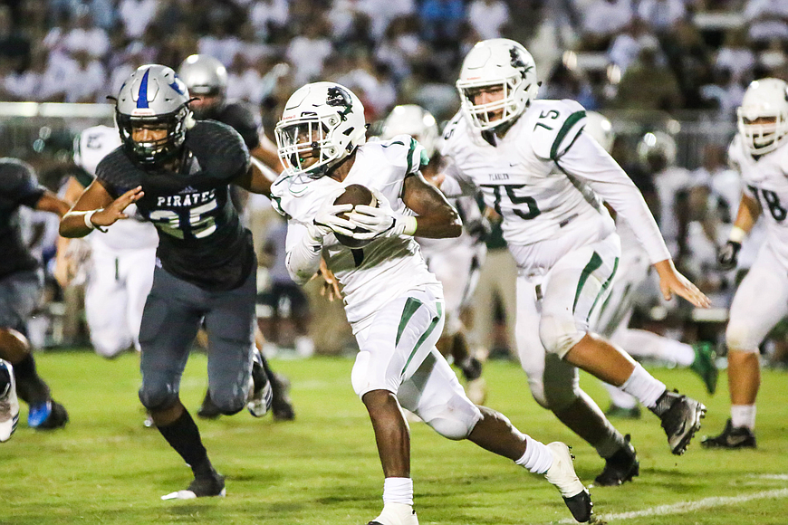 FPC running back Jimmie Robinson runs with the ball against Matanzas. Robinson rushed for 217 yards and two touchdowns against New Smyrna. Photo by Paige Wilson