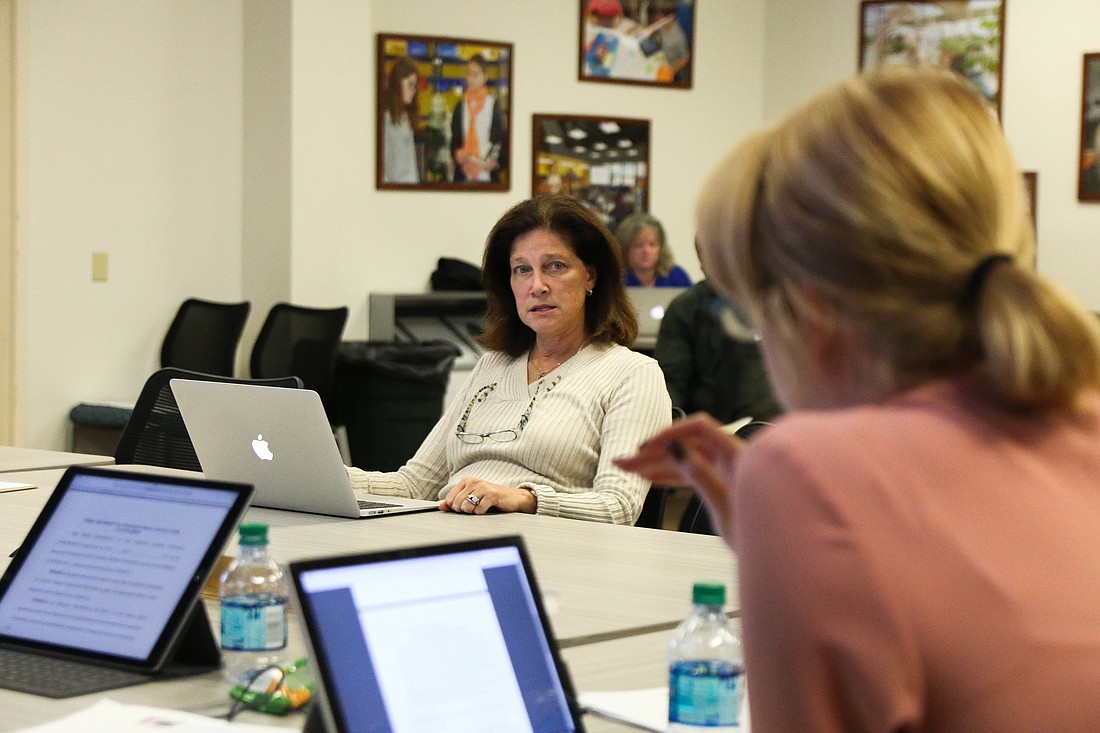 Kristy Gavin of Flagler Schools discusses Palm Harbor Academy's contract with School Board members at the School Board workshop on Sept. 5. Photo by Paige Wilson
