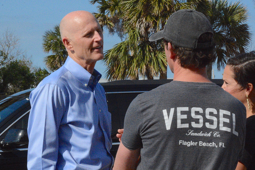 Rick Scott visits Flagler Beach to speak out against efforts to get rid of Visit Florida and Enterprise Florida programs. File photo