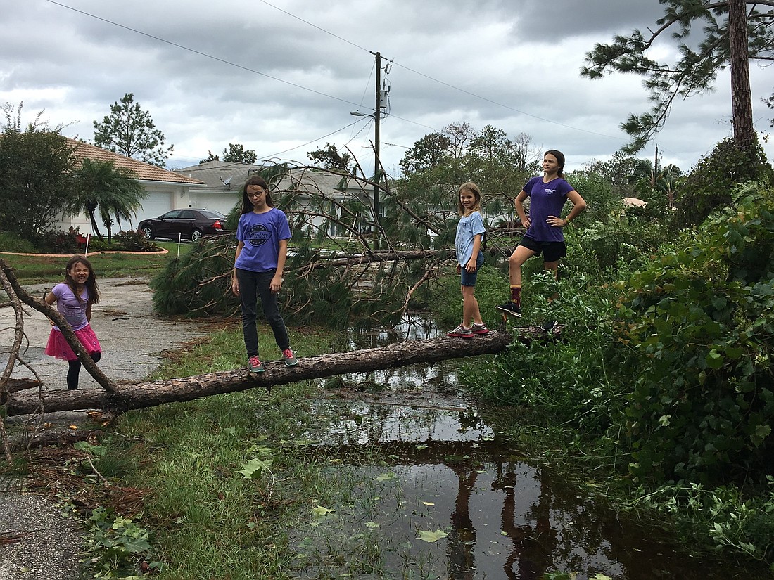 Liana, Keila, Maile and Abigail Brouse show Hurricane Irma who's boss. Photos courtesy of Christina Brouse