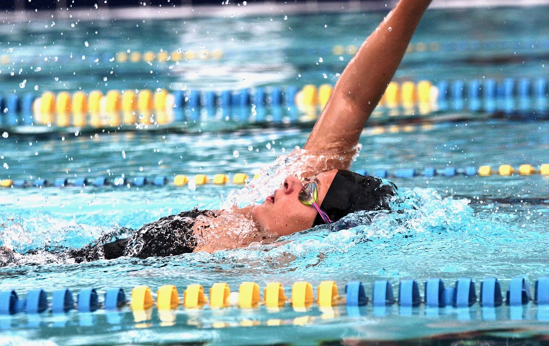 Matanzas swimmer Victoria Woroniecki on her last leg of the 100-meter backstroke. Photo by Ray Boone