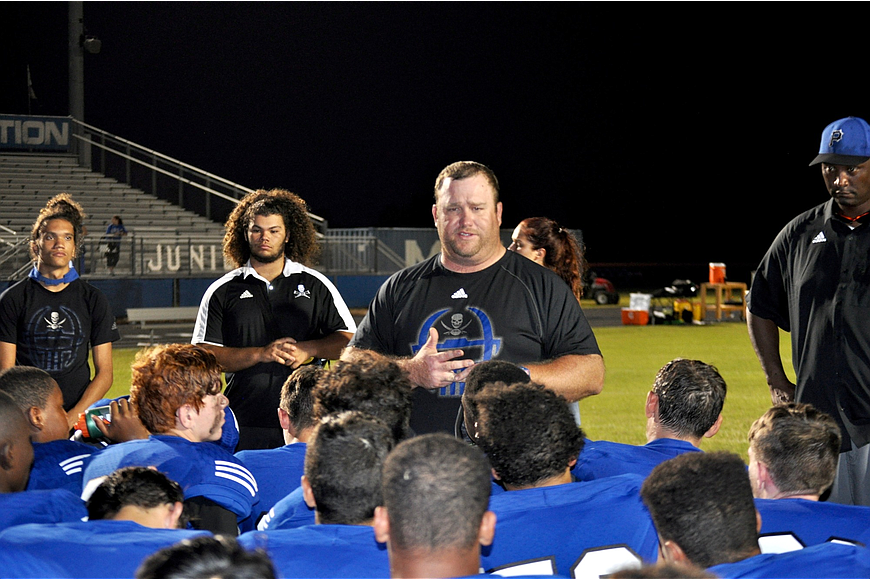 Former Matanzas coach Robert Ripley speaks to the JV team at the start of the 2017 season. Photo by Ray Boone