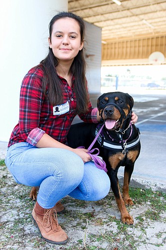 Katia Martynuk, an FPC Community Problem Solver, and Nadja, the dog she's currently training. Photo by Paige Wilson