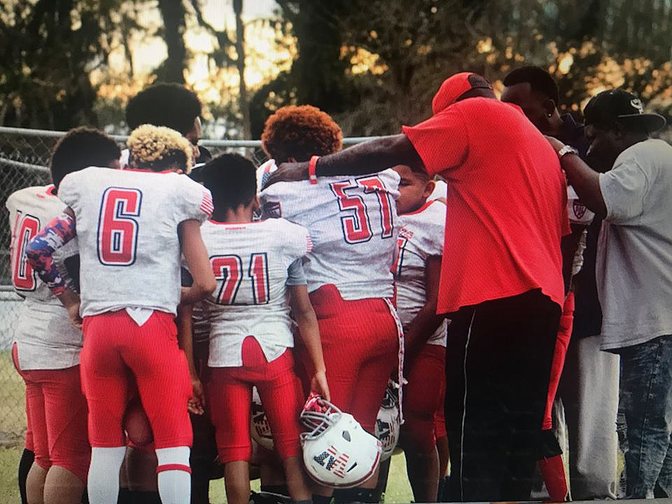 The Flagler Warriors say a prayer before a game. Photo courtesy of Halona Pourier