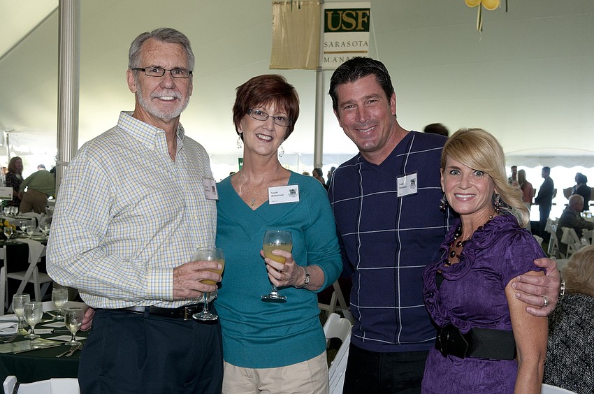 Clayton & Sarah Robertson with Todd & Lisa Montanus