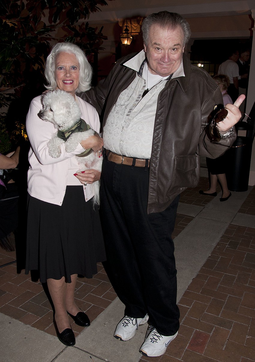 Karin Murphy with dog Mozart and Dr. Raleigh Huizinga