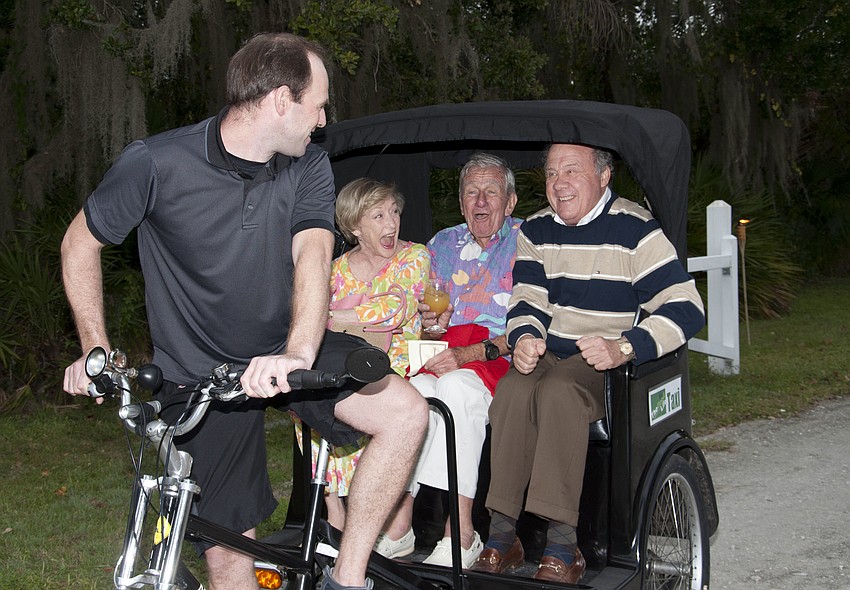 Sara Bagley, Julian Handen and Jim Bagley take a ride