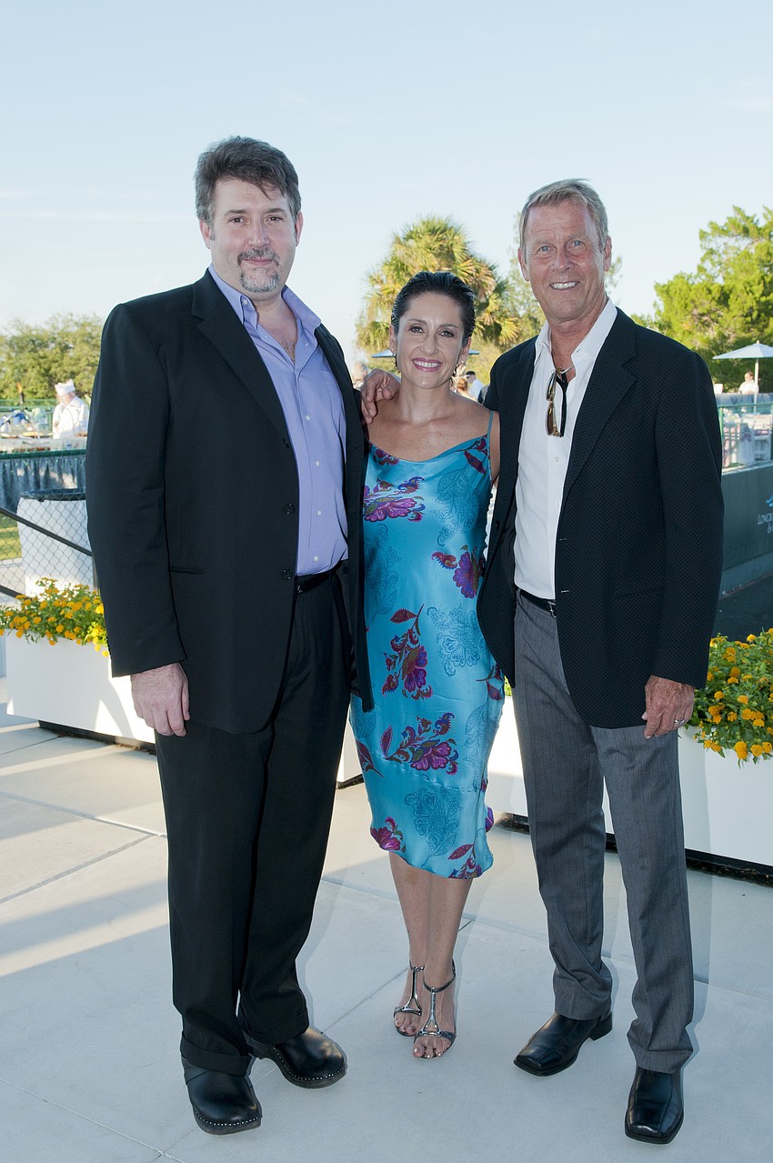 Bob Weile with Beth and John Woods